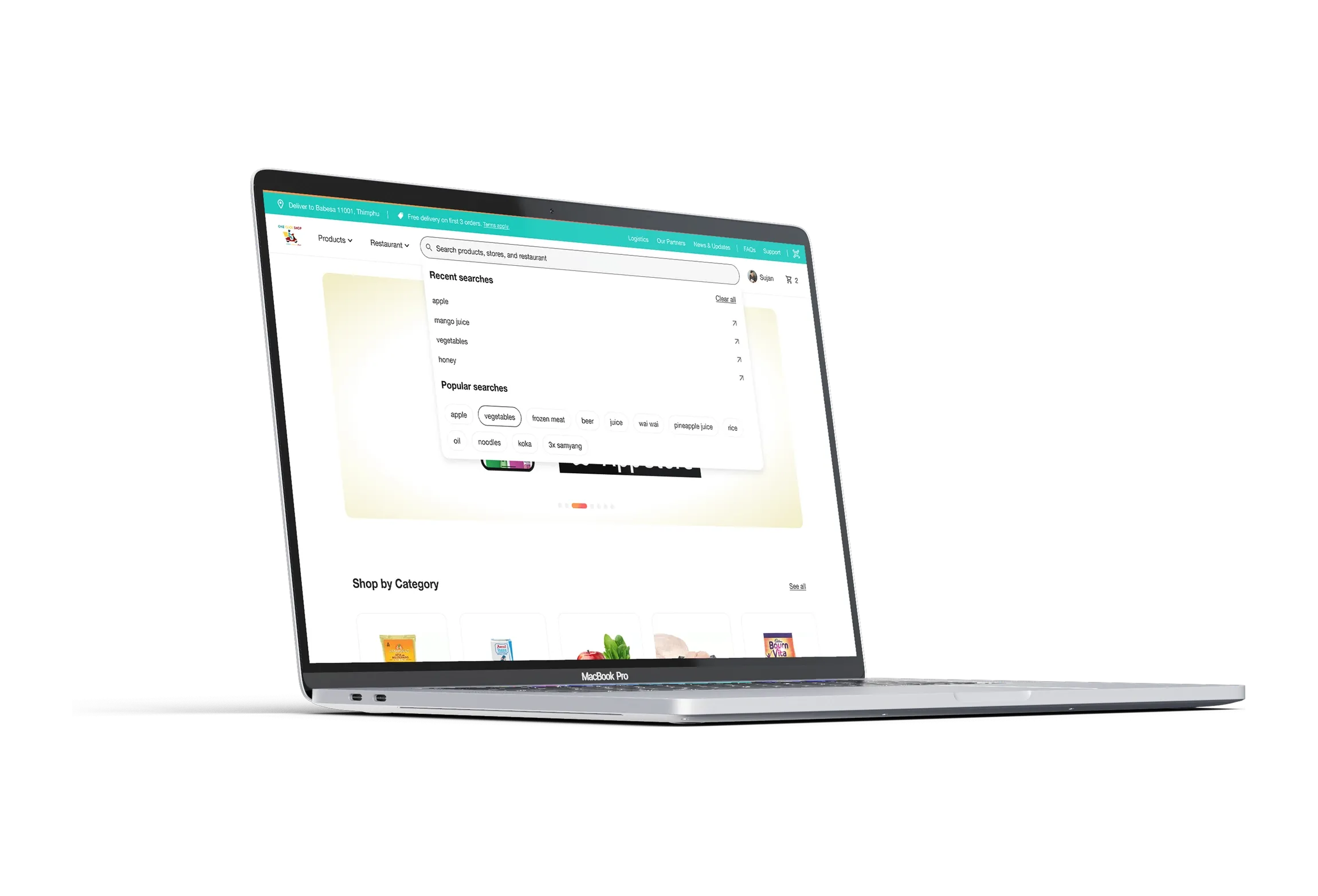 A MacBook Pro showing the empty search field opened. A panel lists Recent searches, apple, mango juice, vegetables, honey, and Popular searches as rounded chips, vegetables, frozen meat, beer, wai wai, rice, noodles.